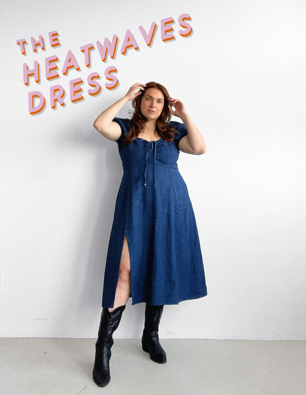 Woman wearing the Heatwaves Dress sewing pattern from Les Perlines on The Fold Line. A dress pattern made in rayon, viscose, cotton, linen, or tencel twill fabric, featuring a fitted bodice with a drawstring detail, short puffy sleeves, shirred back panel, and midi length skirt with a slit.