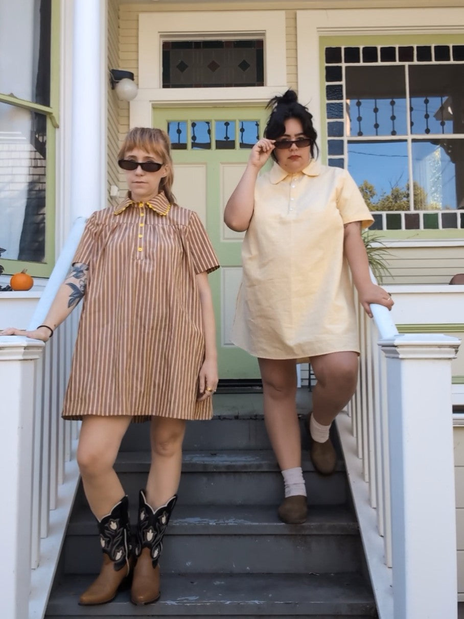 Women wearing the Juno Dress sewing pattern from Spaghetti Western Sewing on The Fold Line. A dress pattern made in cotton lawn, voile, or poplin fabric, featuring a half placket, pointed or rounded collar, large back box pleat, short sleeves, and mini length.