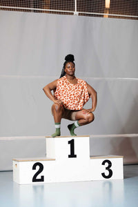 Woman wearing the Kaari Top sewing pattern from TAUKO on The Fold Line. A top pattern made in viscose, tencel, or linen blend fabric, featuring a loose cut, round neckline, and cropped length.