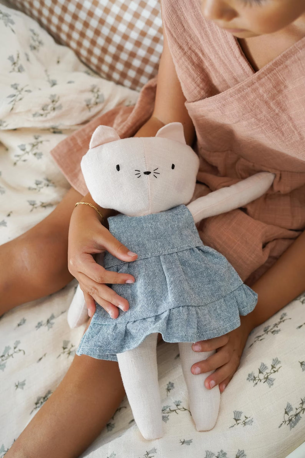 The Klara Kitten sewing pattern from Me & Kiddo Patterns on The Fold Line. A stuffed toy pattern made in linen or cotton fabric, featuring a removable dress.