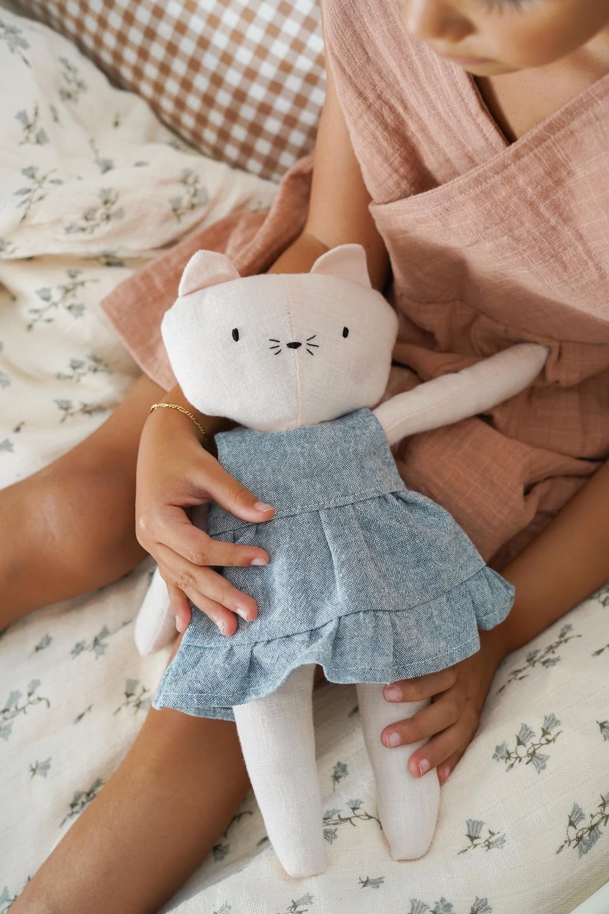 The Klara Kitten sewing pattern from Me & Kiddo Patterns on The Fold Line. A stuffed toy pattern made in linen or cotton fabric, featuring a removable dress.