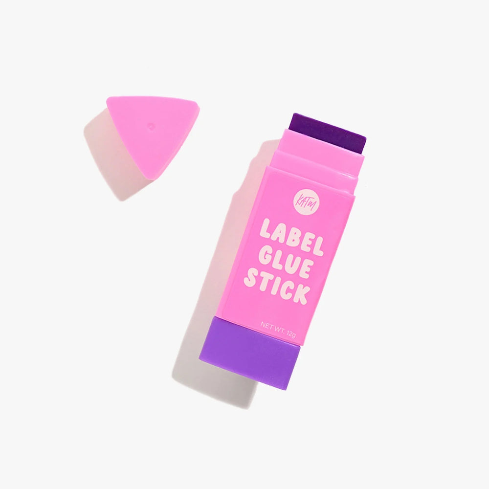The Label Glue Stick from Kylie & The Machine on The Fold Line. This soft and smooth glue in a pink tube holds better than pins.