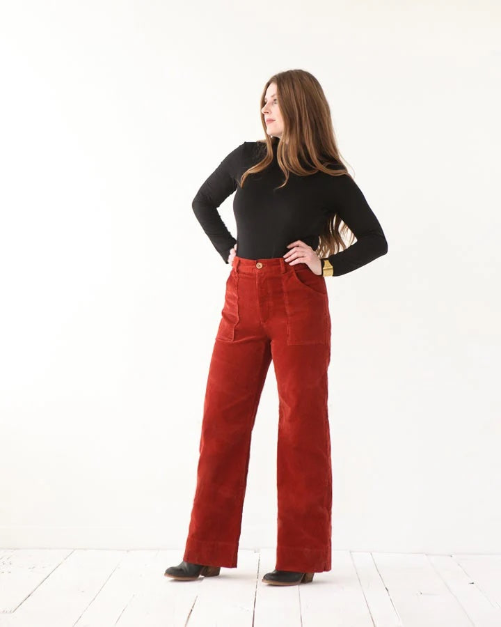 Woman wearing the Lander Zipper Expansion Pack sewing pattern from True Bias on The Fold Line. An add-on to the Lander Pant pattern made in twill, linen, corduroy, or denim fabric, featuring a high waist, straight leg, zip fly, belt loops, and pockets.