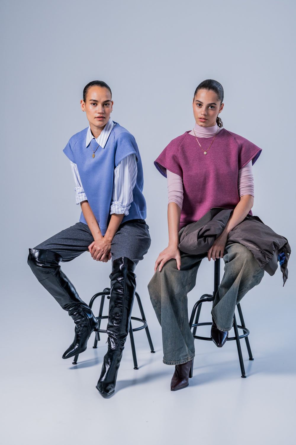 Women wearing the Leni Top sewing pattern from Fibre Mood on The Fold Line. A top pattern made in sweater knit or softshell fabric, featuring a relaxed fit, round neckline, and short raglan sleeves.