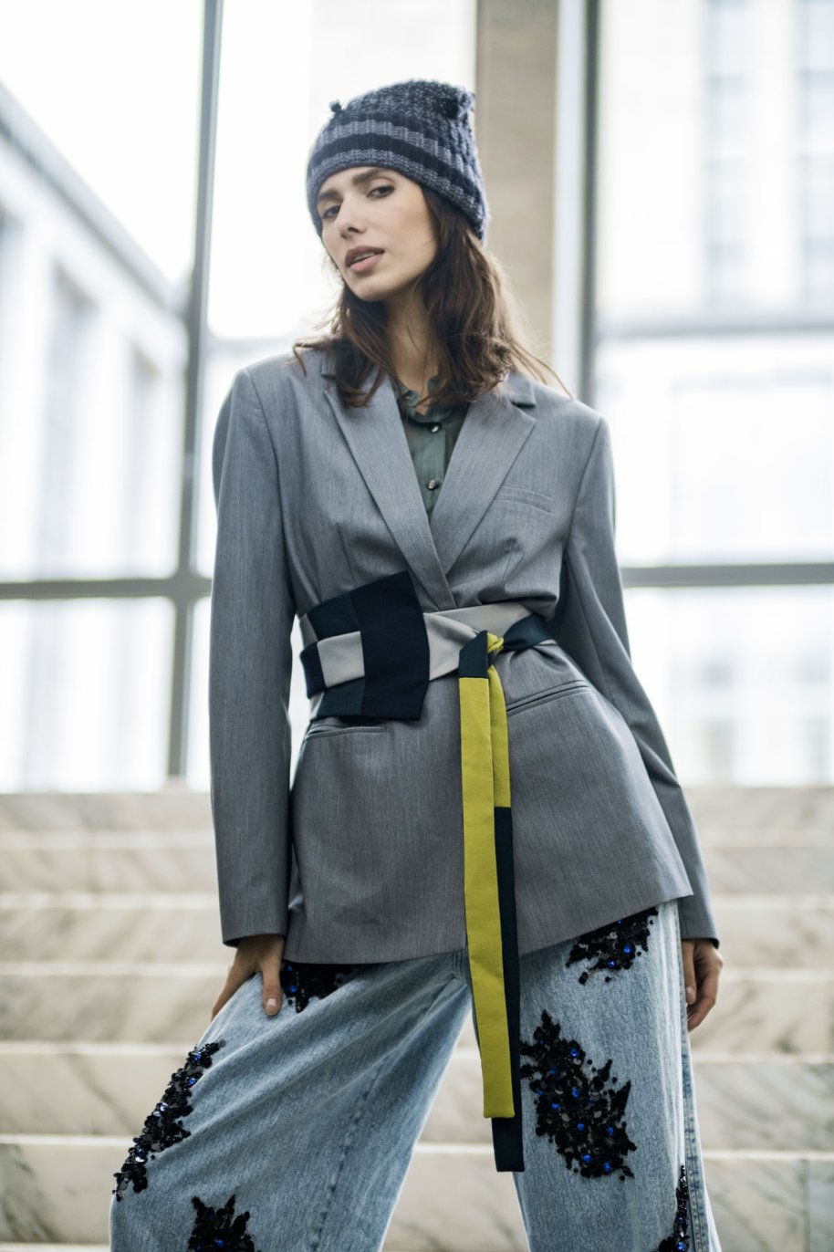 Woman wearing the Liverpool Street Belt sewing pattern from Fibre Mood on The Fold Line. A belt pattern made in cotton, linen, wool, or silk fabric, featuring a Japanese-inspired design with long ties.