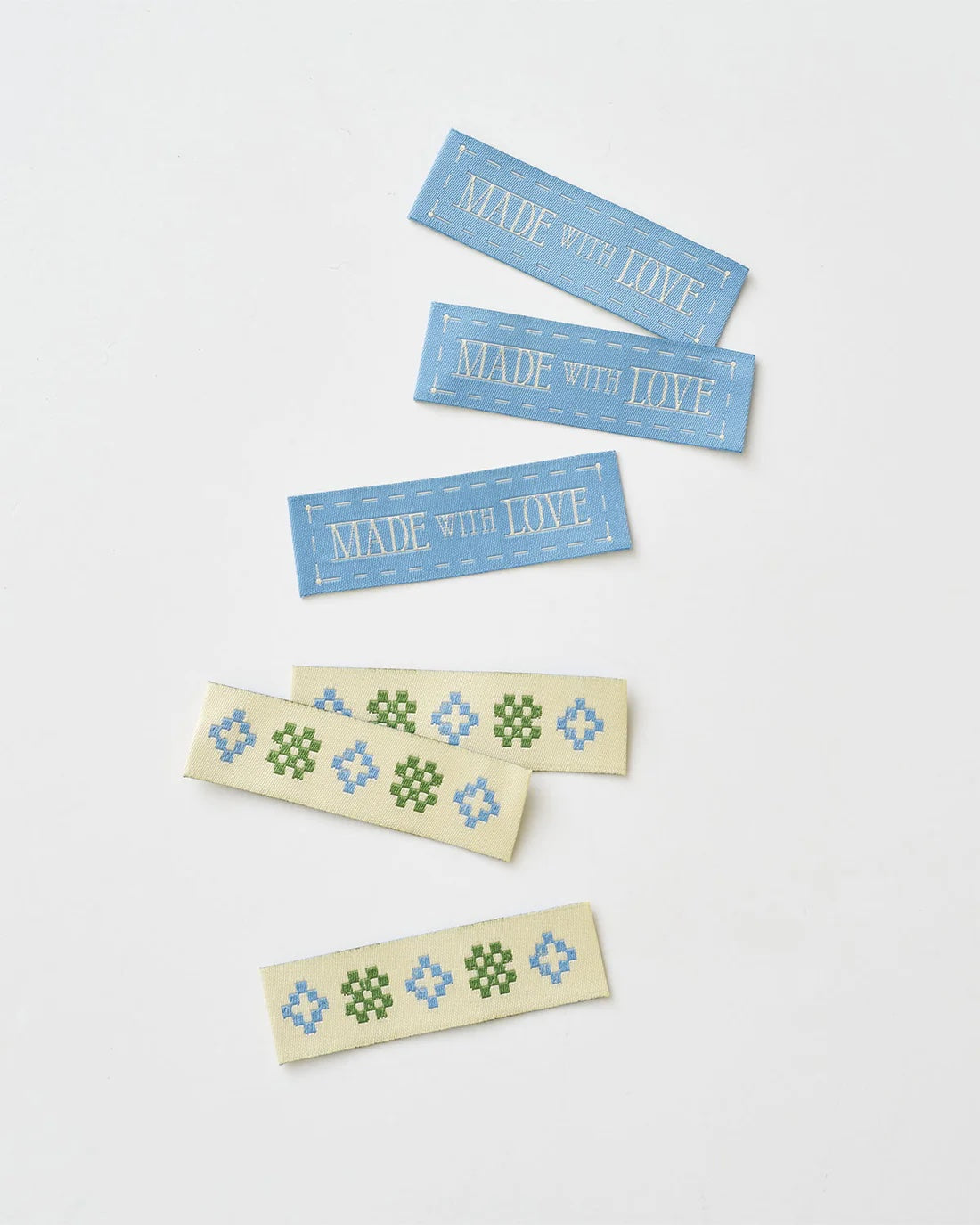 'Made with Love Sketchy Quilt Blue' woven labels from Matchy Matchy Sewing Club on The Fold Line. The pack includes 6 woven labels to sew onto your handmade clothes and accessories.