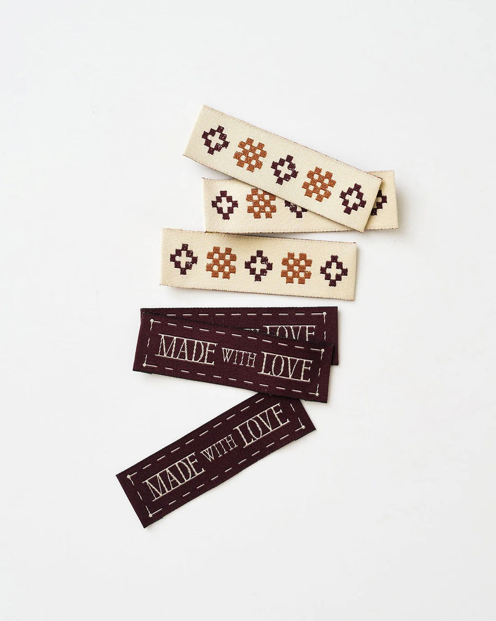 'Made with Love Sketchy Quilt Currant' woven labels from Matchy Matchy Sewing Club on The Fold Line. The pack includes 6 woven labels to sew onto your handmade clothes and accessories.