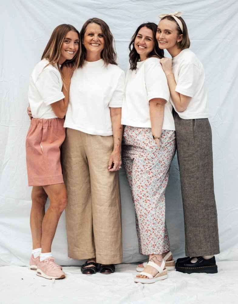 Women wearing the Madeline Bundle sewing pattern bundle from Madswick on The Fold Line. A capsule wardrobe pattern bundle made in woven and knit fabric, including a tee, pants and shorts.