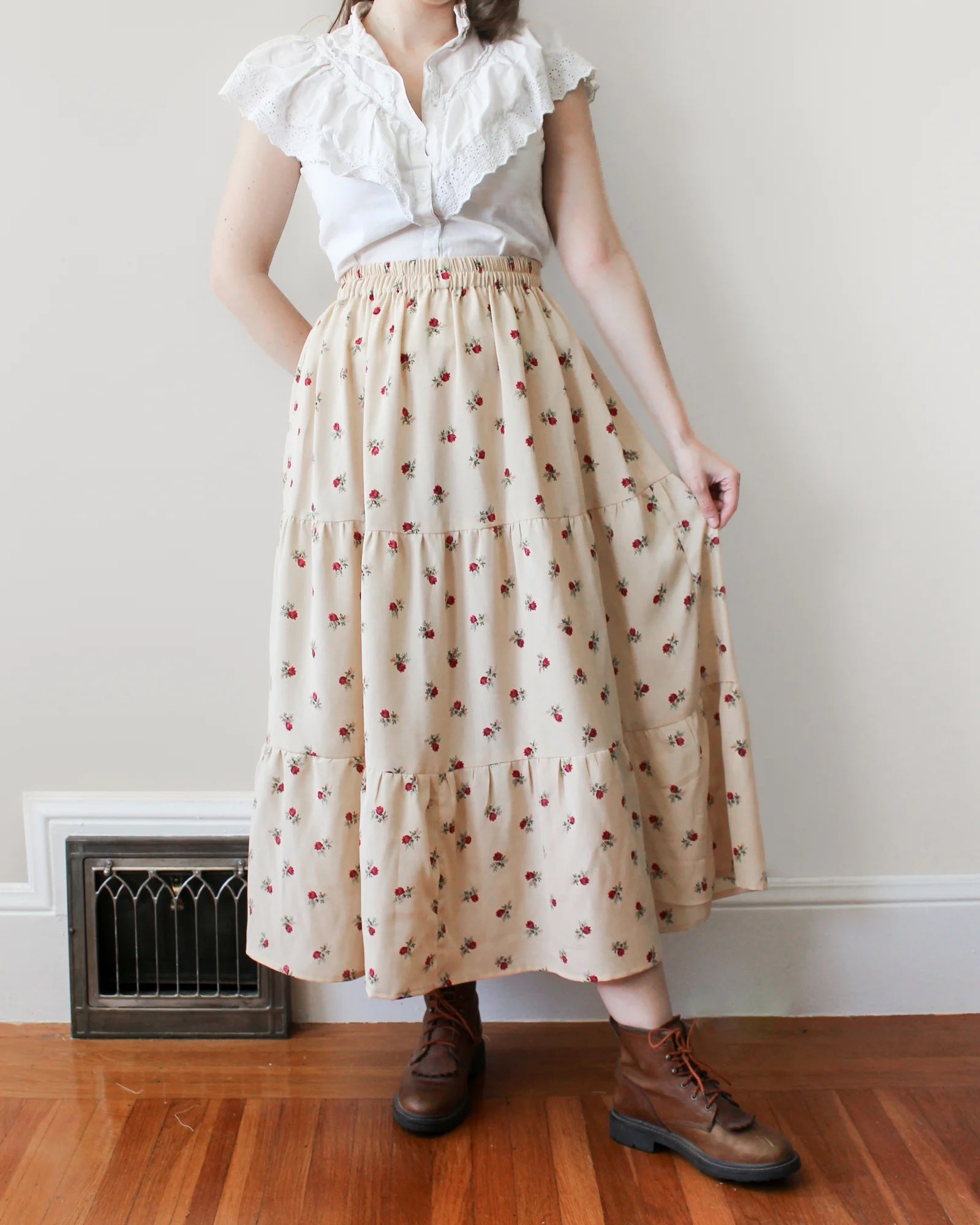 Woman wearing the Meadow Skirt sewing pattern from Oh Me Oh My Sewing on The Fold Line. A skirt pattern made in quilting cotton, washed linen, cotton lawn, voile, or rayon challis fabric, featuring an elastic waist and three gathered tiers.