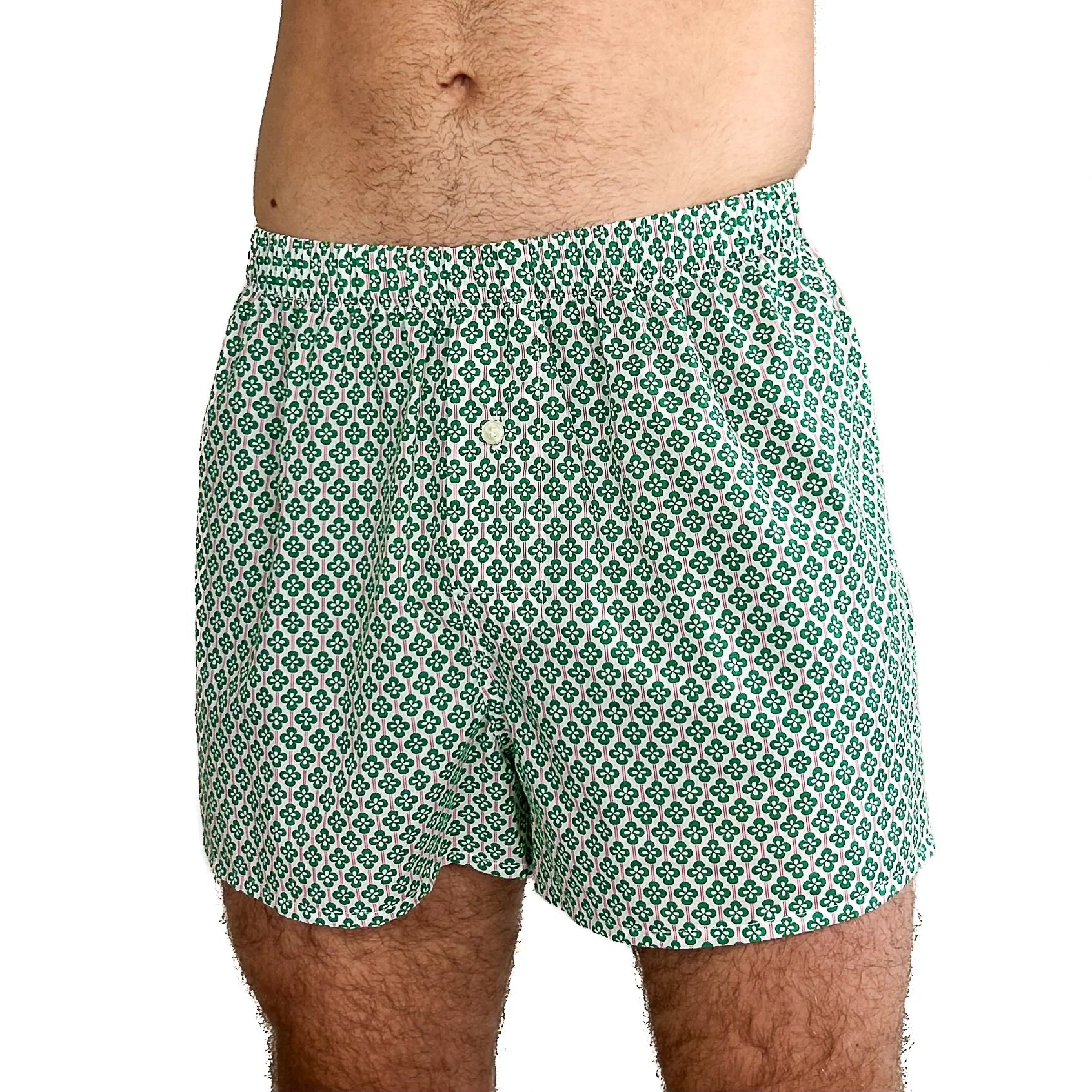 Man wearing the Men's Hugo Boxers sewing pattern from Dhurata Davies Patterns on The Fold Line. An underwear pattern made in cotton lawn, poplin, percale, voile, sateen, lightweight linen, or linen blend fabric, featuring a relaxed fit, elasticated waist, front fly with a button, and shaped back with a centre panel.