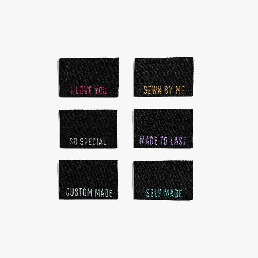 'Metallic Side Seams (Black)' woven labels from Kylie & The Machine on The Fold Line. The pack includes 6 woven labels ready to be sewn into your handmade clothes.