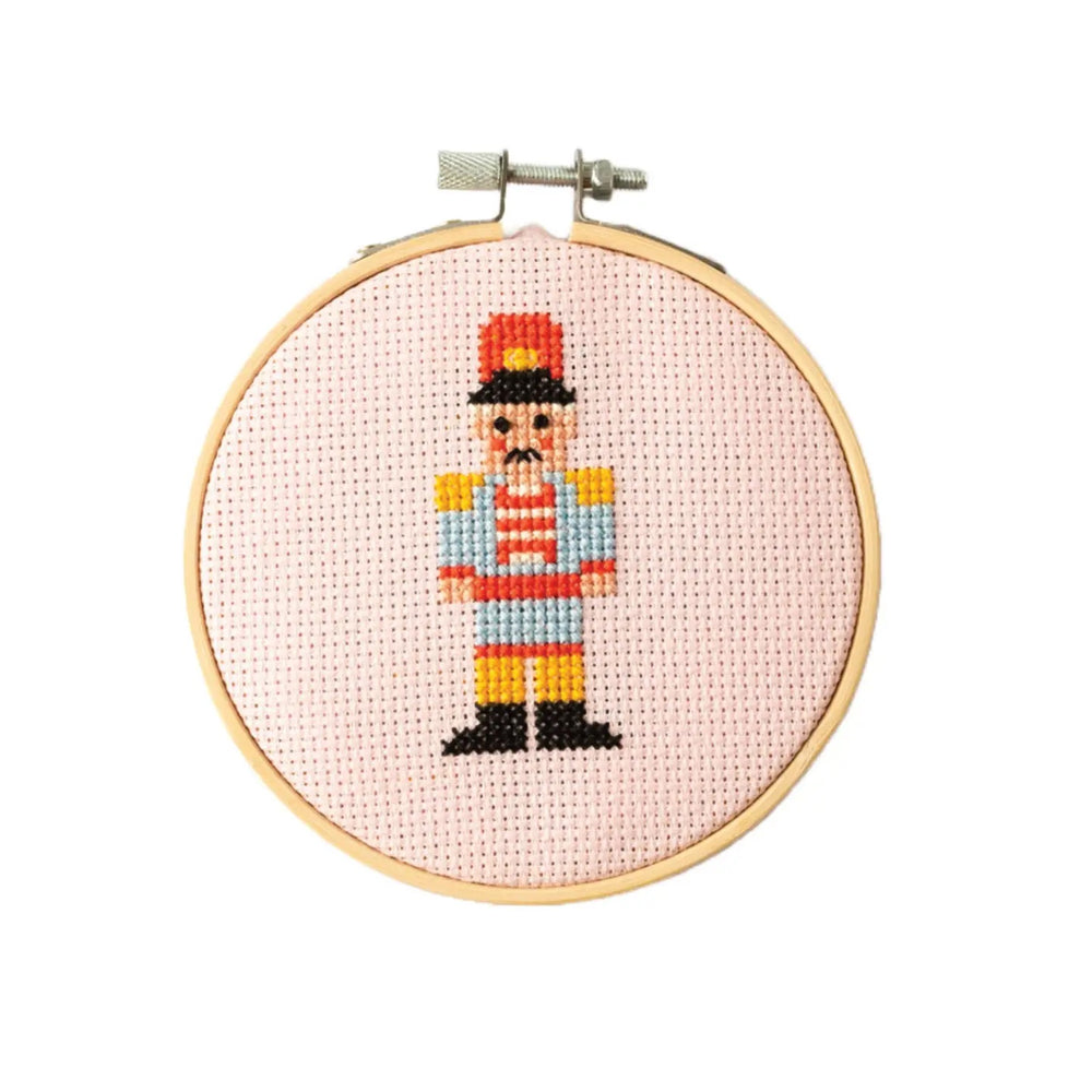 The Nutcracker Cross Stitch Kit from Cotton Clara on The Fold Line. A contemporary mini cross stitch kit perfect for a beginner embroiderer.