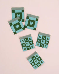 'One of One Square' woven labels from Matchy Matchy Sewing Club on The Fold Line. The pack includes 6 woven labels to sew onto your handmade clothes and accessories.