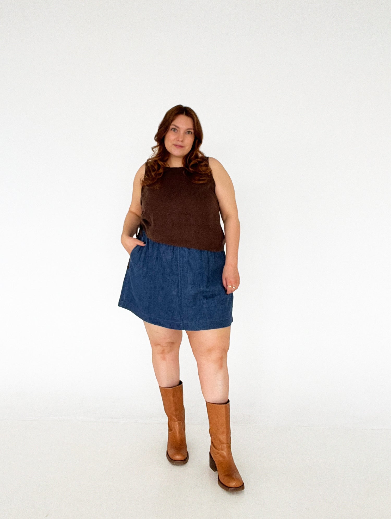 Woman wearing the Playback Skort sewing pattern from Les Perlines on The Fold Line. A skort pattern made in cotton, linen, twill, corduroy, or denim fabric, featuring an elasticated waistband, side pockets, and mini length. 
