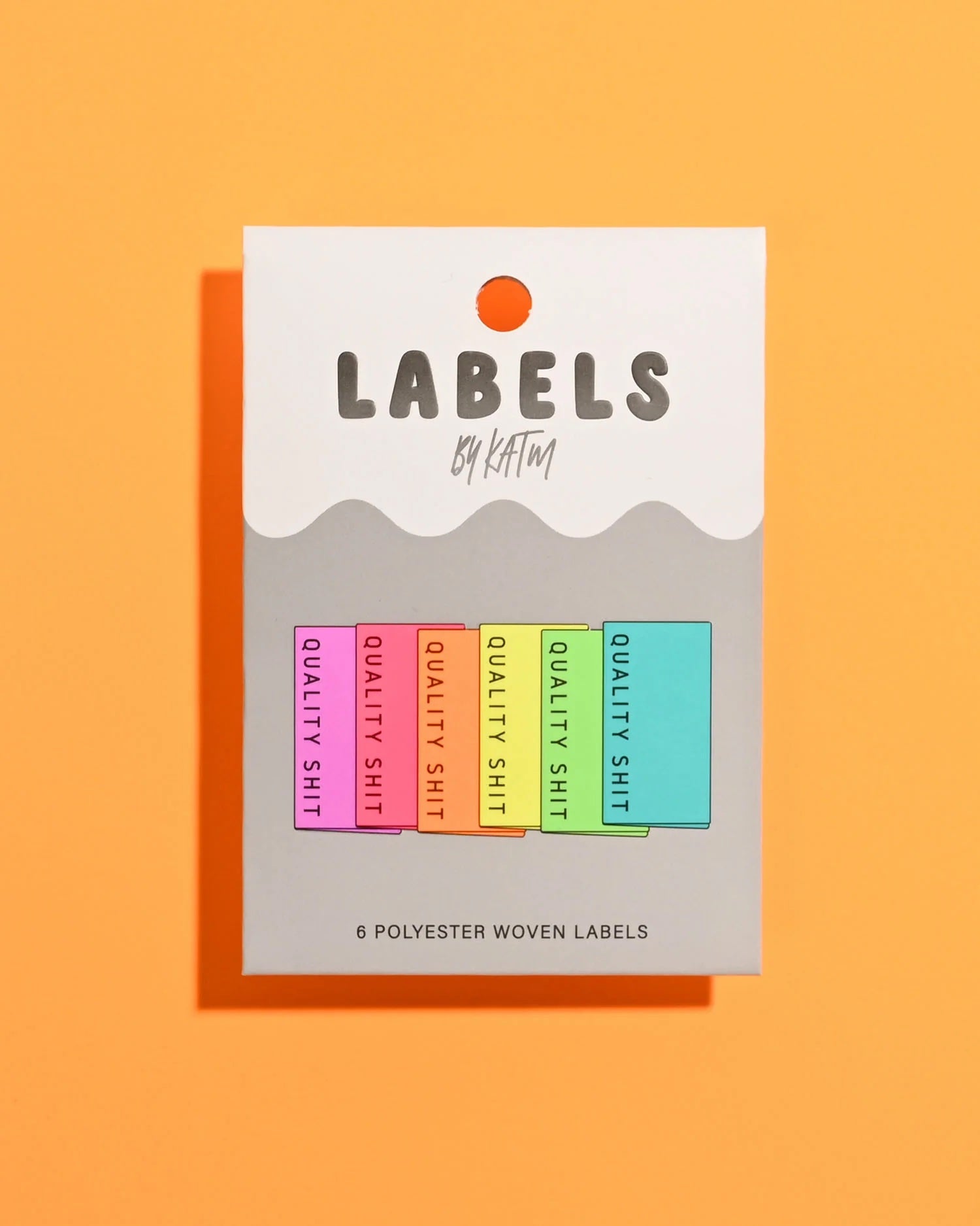 'Quality Shit (Neon)' woven labels from Kylie & The Machine on The Fold Line. The pack includes 6 woven labels ready to be sewn into your handmade clothes.