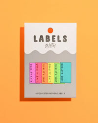 'Quality Shit (Neon)' woven labels from Kylie & The Machine on The Fold Line. The pack includes 6 woven labels ready to be sewn into your handmade clothes.