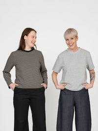Women wearing the Regular Fit T-shirt sewing pattern from The Assembly Line on The Fold Line. A top pattern made in jersey fabric, featuring a relaxed unisex fit, round neckline, and short or long sleeves.