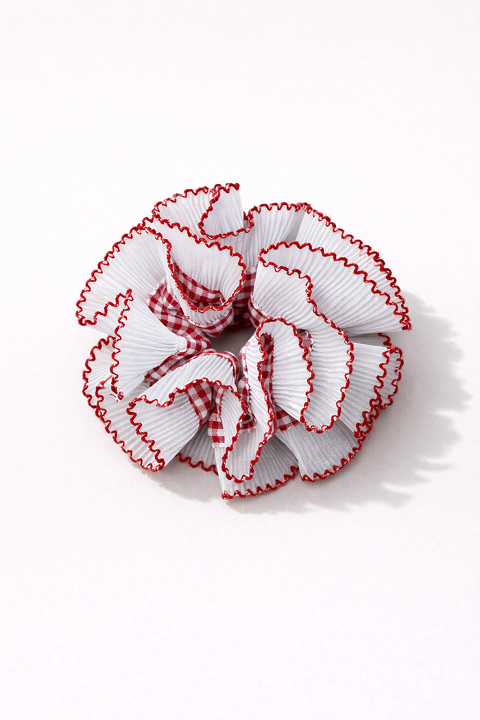 The Ruffle Scrunchie sewing pattern from JULIANA MARTEJEVS on The Fold Line. A scrunchie pattern made in taffeta, poplin, or silk fabric, featuring a soft inner band and dramatic outer frill.