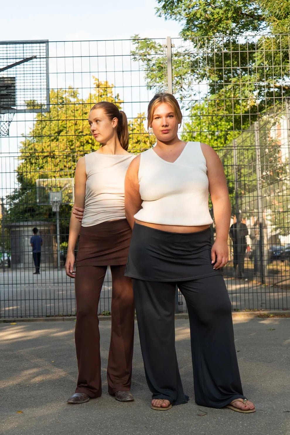 Women wearing the Skirty Pants sewing pattern from Puff and Pencil on The Fold Line. A pants pattern made in jersey fabric, featuring a fitted elastic waist with an optional skirt attachment.