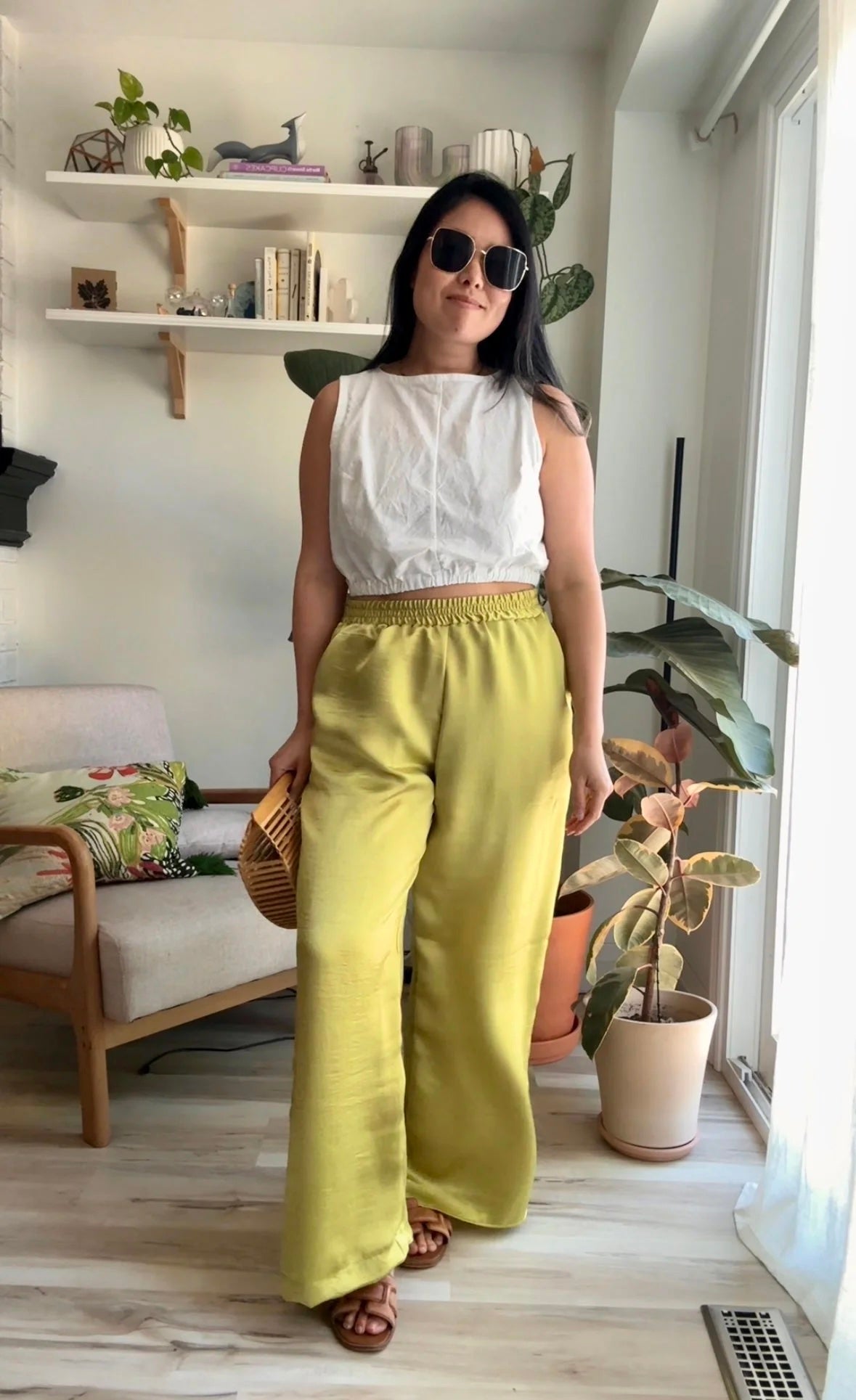 Woman wearing the Sourdough Pants sewing pattern from Sew Bake Make on The Fold Line. A trousers pattern made in linen, linen blend, twill, lightweight canvas or denim, cotton, cotton blend, sweatshirt, rayon, or viscose fabric, featuring an elastic waistband and pockets.