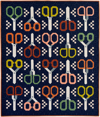 The Stay Sharp Quilt sewing pattern from Pen + Paper Patterns on The Fold Line. A quilt pattern made in quilting cotton fabric, featuring four different scissor designs.