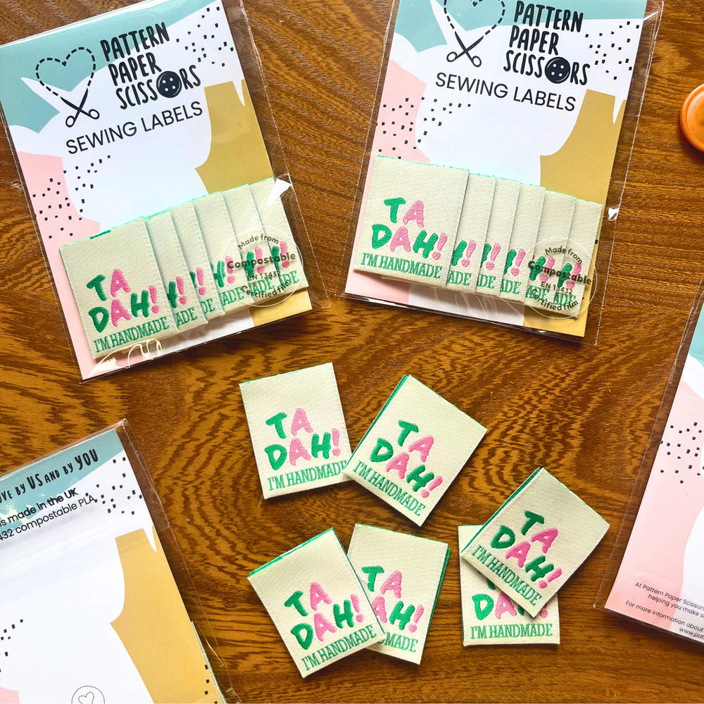 'Ta Dah! I’m Handmade' woven labels from Pattern Paper Scissors on The Fold Line. The pack includes 6 woven labels ready to be sewn into your handmade clothes.
