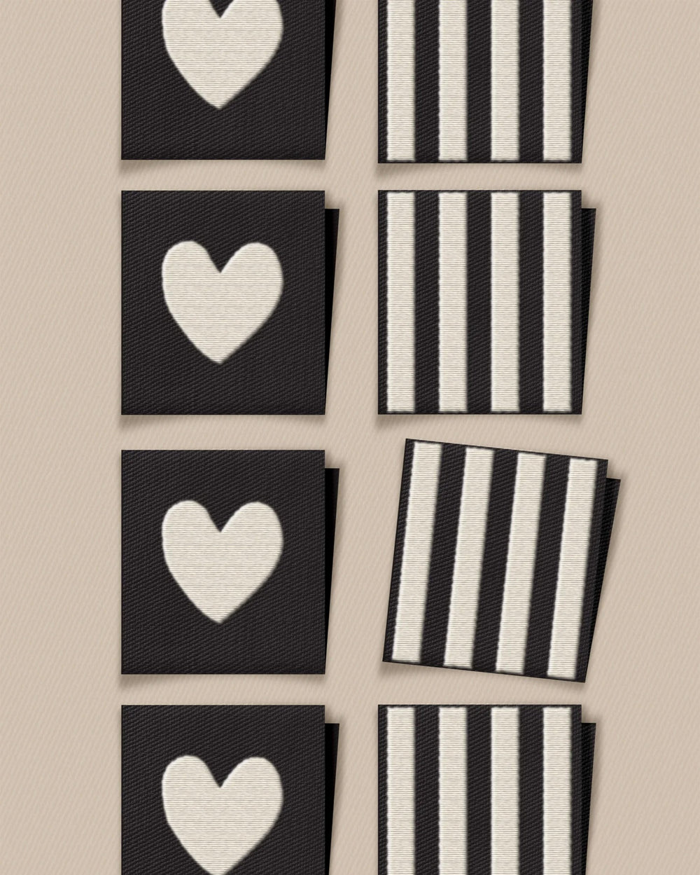 'White Heart and Stripe Square' woven labels from Matchy Matchy Sewing Club on The Fold Line. The pack includes 8 woven labels to sew onto your handmade clothes and accessories.