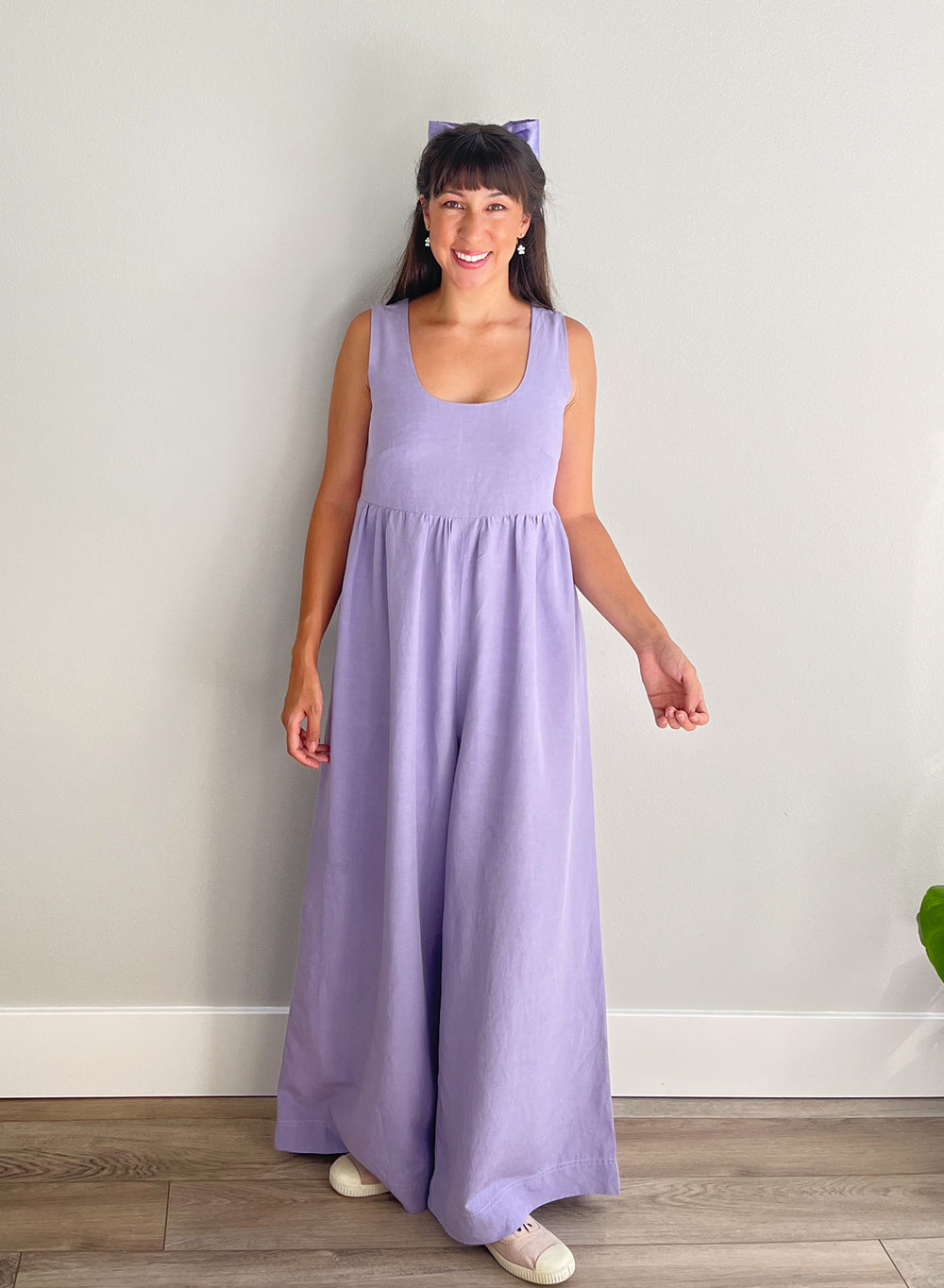 Women wearing the Carmel Jumpsuit sewing pattern from Nina Lee on The Fold Line. A jumpsuit pattern made in linen, linen blends, tencel, viscose, chambray or lightweight wool fabrics, featuring a high relaxed waistline, voluminous legs, deep pockets, scoo