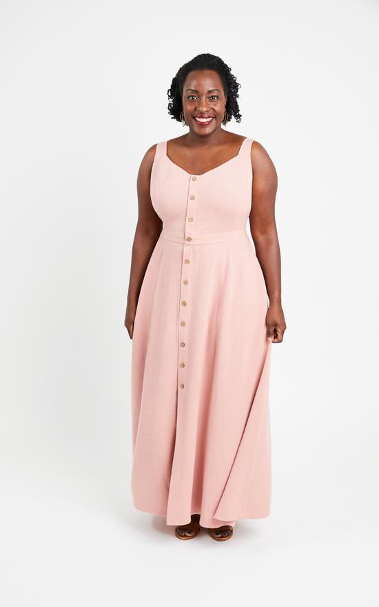 Woman wearing the Holyoke Maxi Dress sewing pattern by Cashmerette. A maxi dress pattern made in light to mid-weight wovens such as cotton lawn, linen or rayon fabric featuring wide bra friendly straps, an angled neckline and a button front.