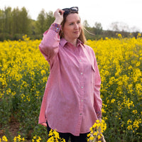 Woman wearing the Unisex Cesario Shirt sewing pattern from Sew Me Something on The Fold Line. A shirt pattern made in cotton, chambray, viscose rayon, cotton lawn, linen, lightweight denim, seersucker or double gauze fabrics, featuring a two-piece collar,