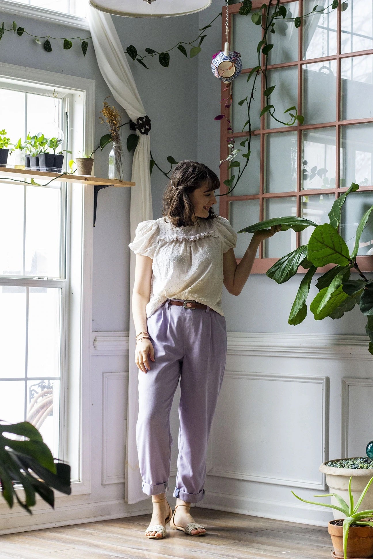 Woman wearing the Chandler Trousers sewing pattern from Untitled Thoughts on The Fold Line. A trouser pattern made in linen, chambray, cotton poplin, rayon challis, rayon/linen blend, tropical weight wool, wool suiting, silk noil, silk charmeuse or flanne