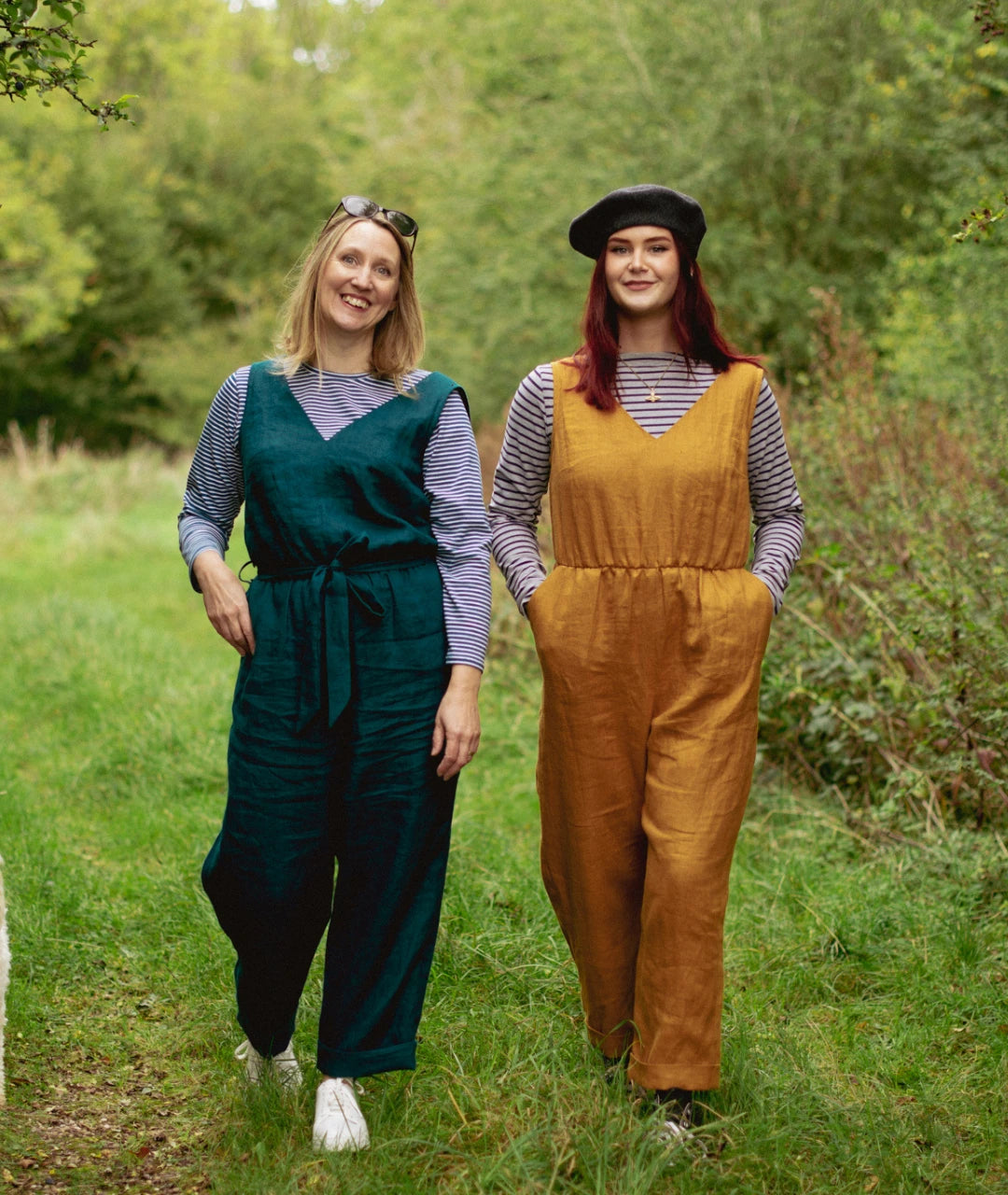 Women wearing the Cleo Jumpsuit sewing pattern from Sew Me Something on The Fold Line. A sleeveless jumpsuit pattern made in velvet, linen, light weight denim, cotton or viscose rayon fabrics, featuring a V-neck, wrap over back bodice, relaxed fit, pocket