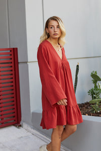 Women wearing the Clio Dress sewing pattern from The Patterns Room on The Fold Line. A dress pattern made in viscose (rayon), tencel (lyocel), voile or double gauze fabrics, featuring no closures, knee length, loose fit, deep V neckline, long A-line sleev