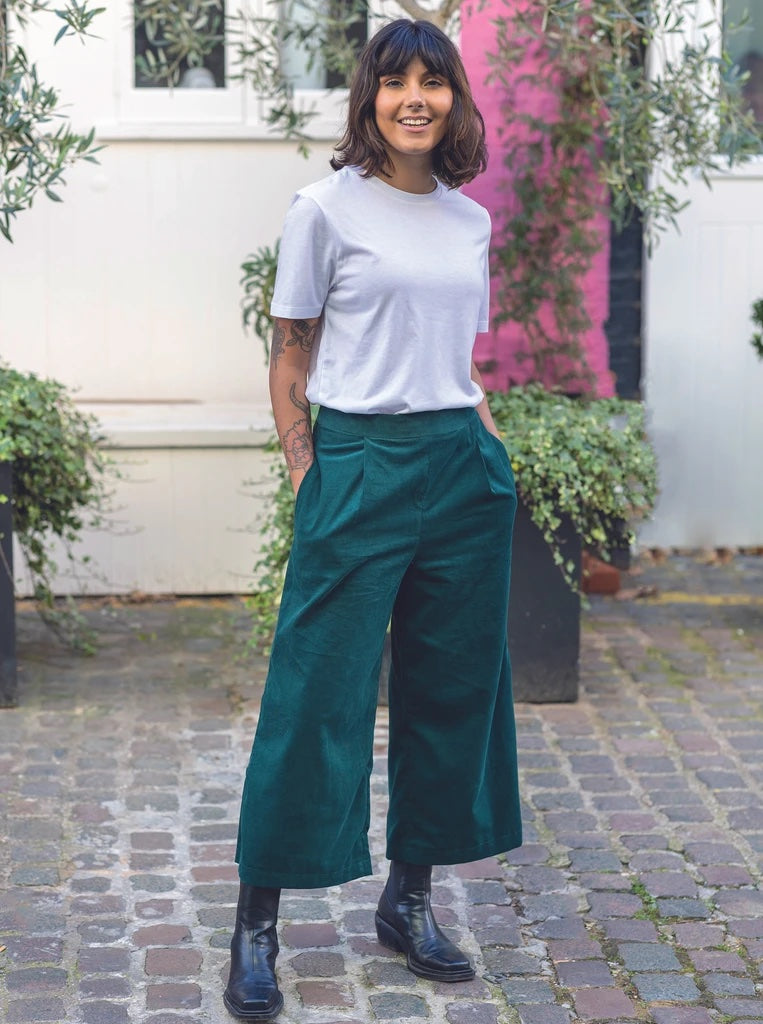 Woman wearing The Culottes sewing pattern from The Avid Seamstress on The Fold Line. A culotte’s pattern made in cotton, cotton lawn, poplin, corduroy, chambray, denim, linen, Tencel or velvet fabrics, featuring front pleats, large in-seam pockets, fitted