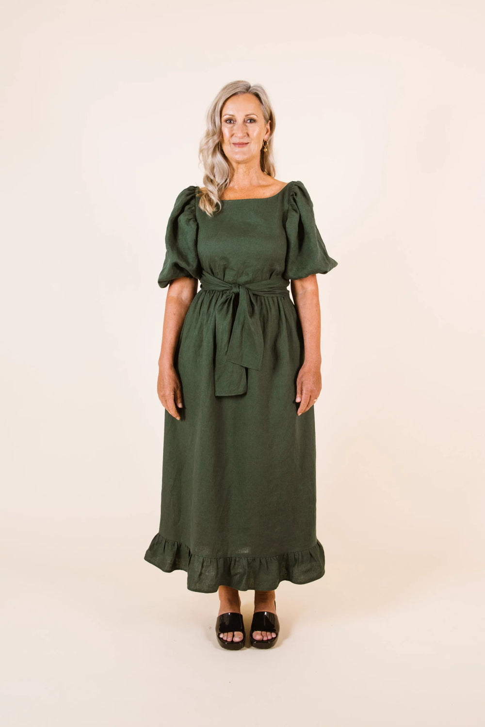 Women wearing the Estella Dress sewing pattern from Papercut Patterns on The Fold Line. A dress pattern made in cotton, linen, silk or rayon fabrics, featuring elbow length puff sleeves, relaxed fit, frilled hem, ankle length, elasticated waist, pockets, 