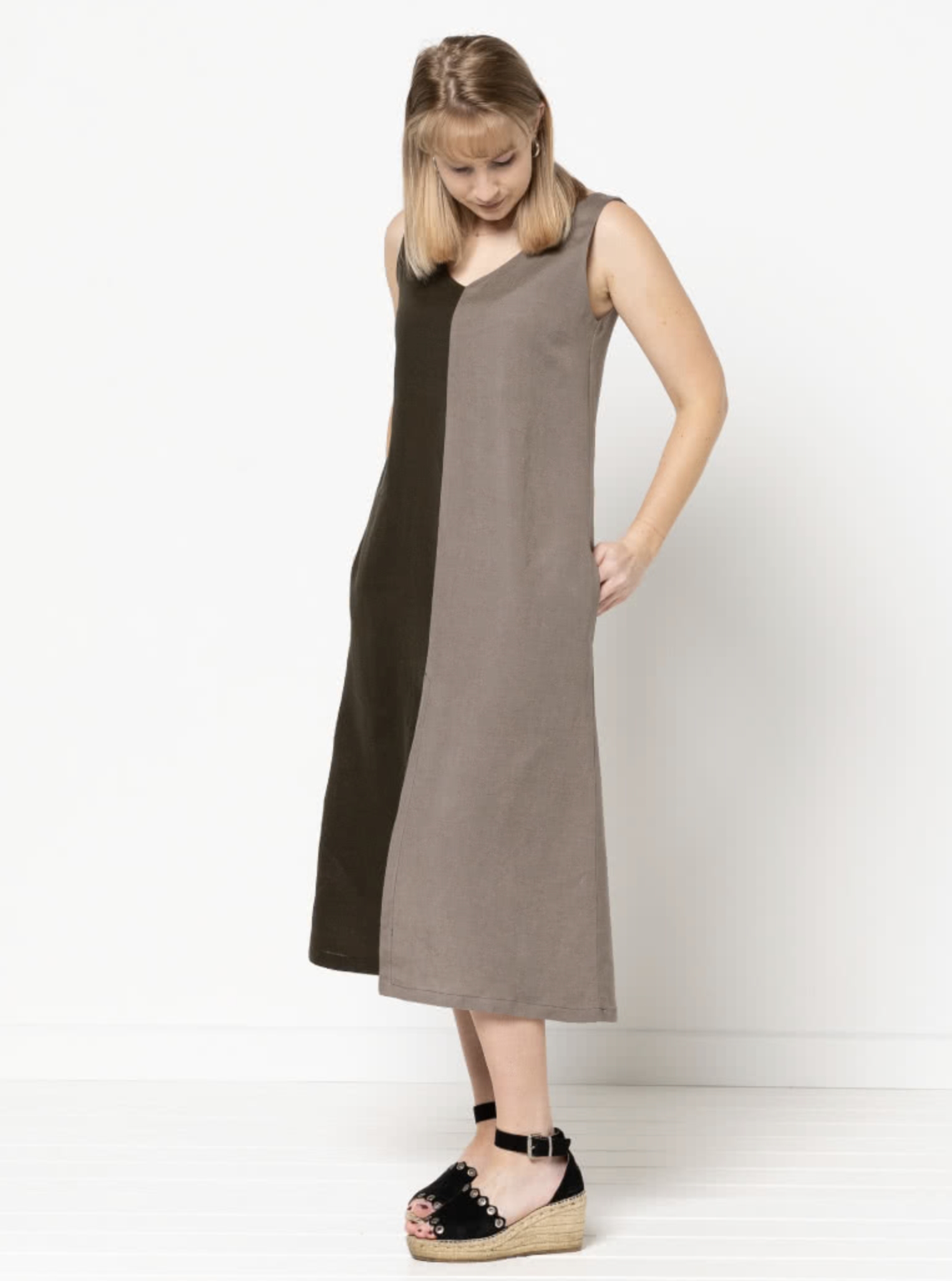 preen line esther dress A bespoke wedding gown for Alicia, featuring a graceful draped silhouette, crafted with a mix of two textured fabrics and adorned with delicate hand-beaded organza flowers