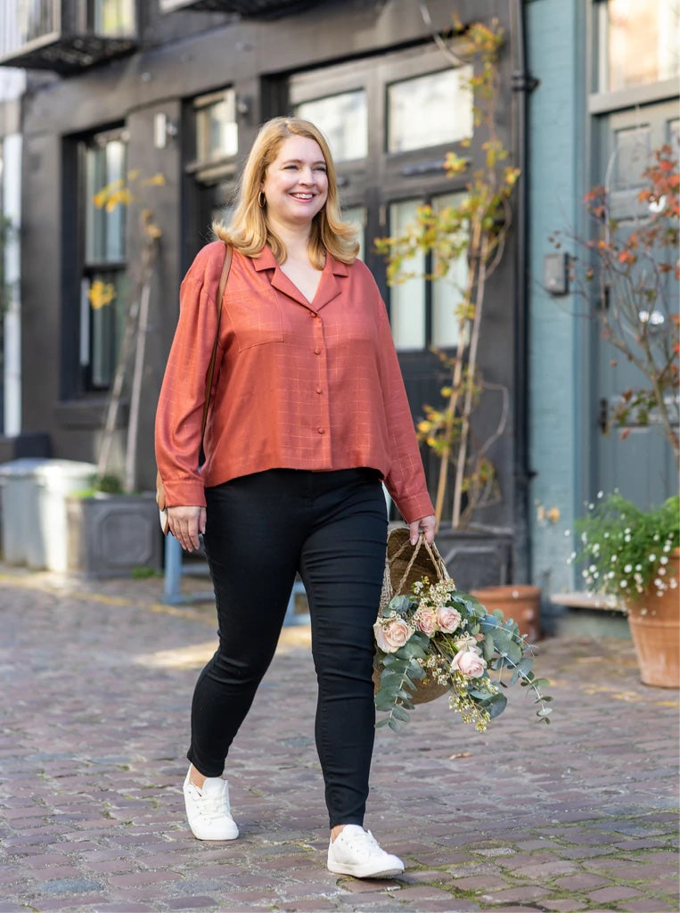 Woman wearing The Everyday Shirt sewing pattern from The Avid Seamstress on The Fold Line. A shirt dress pattern made in cottons, chambray, Tencel, linen, lightweight denim or viscose fabrics, featuring a relaxed fit, V-neck with open collar, dropped slee