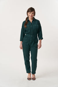 Woman wearing the Farrah Jumpsuit sewing pattern from Sew Over It on The Fold Line. A jumpsuit pattern made in cotton twill, corduroy, cotton drill, twill crepe, or stretch denim fabrics, featuring a button-up front, collar and collar stand, patch pockets