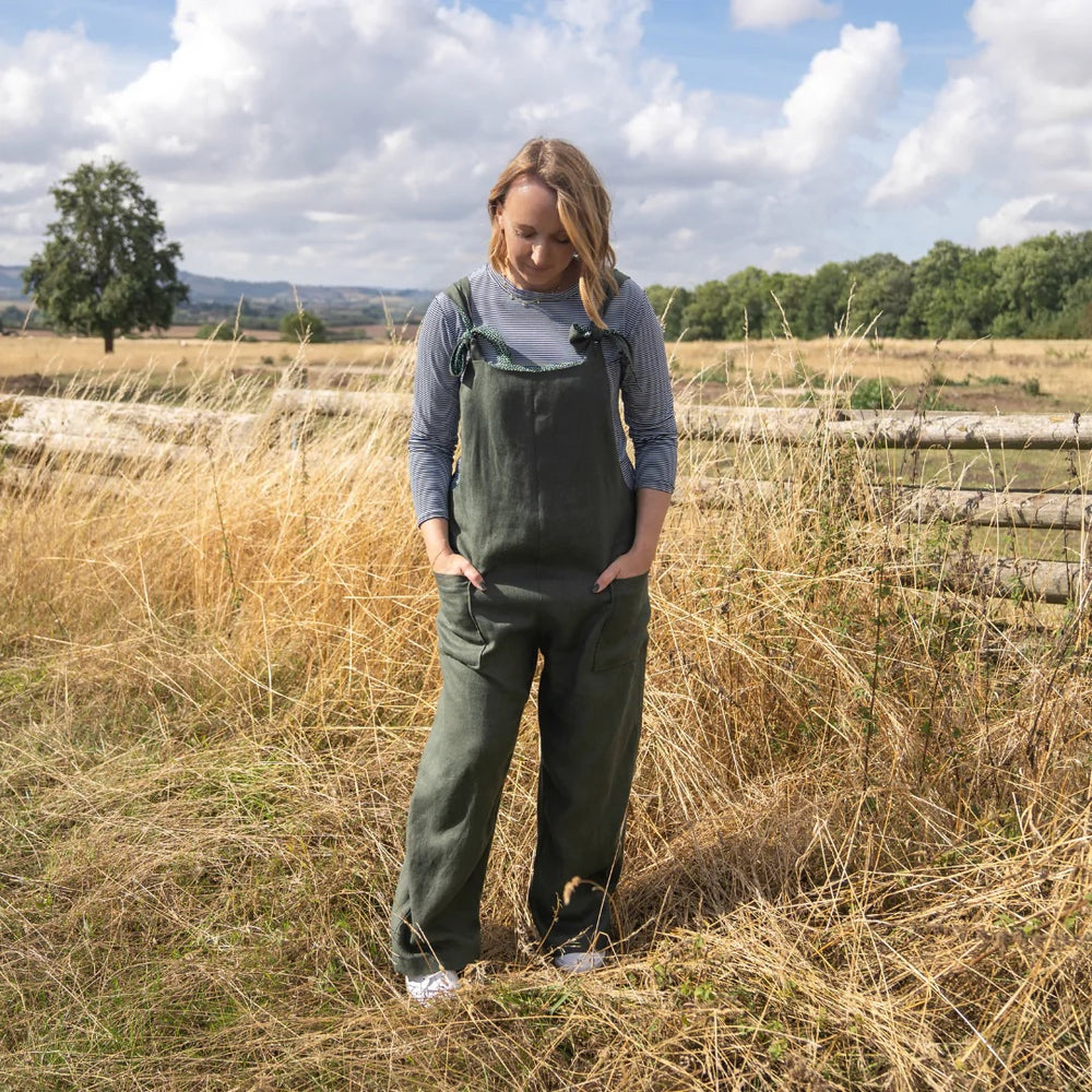 Woman wearing the Ferdi Dungarees sewing pattern from Sew Me Something on The Fold Line. A dungarees pattern made in medium to light weight cotton, light weight denim, linen, corduroy, double gauze or medium to heavy weight viscose fabrics, featuring a re