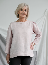 Woman wearing the Florence Woven Top sewing pattern from Style Arc on The Fold Line. A top pattern made in washed linen, crepe, cotton or rayon fabrics, featuring a relaxed fit, 3/4-length sleeve with shoulder tuck and wide double cuff, hem band and butto