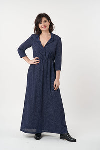Woman wearing the Florence Dress sewing pattern from Sew Over It on The Fold Line. A dress pattern made in chiffon, rayon, crepe or georgette fabrics, featuring a button-up bodice, stand collar, 3/4 length set-in sleeves, elasticated waist, maxi lengths, 