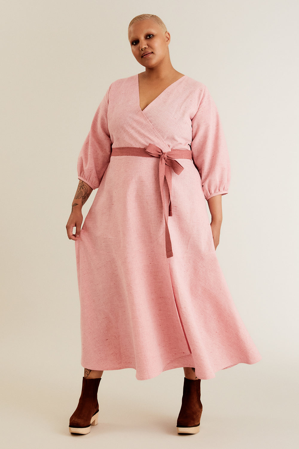 Women wearing the Hali Wrap Dress sewing pattern Named on The Fold Line. A dress pattern made in cotton, linen, Tencel and rayon shirtings or dress-weight fabrics, featuring a semi-fitted wrap bodice, front V-neck, back yoke, wrap tie closure, side pocket