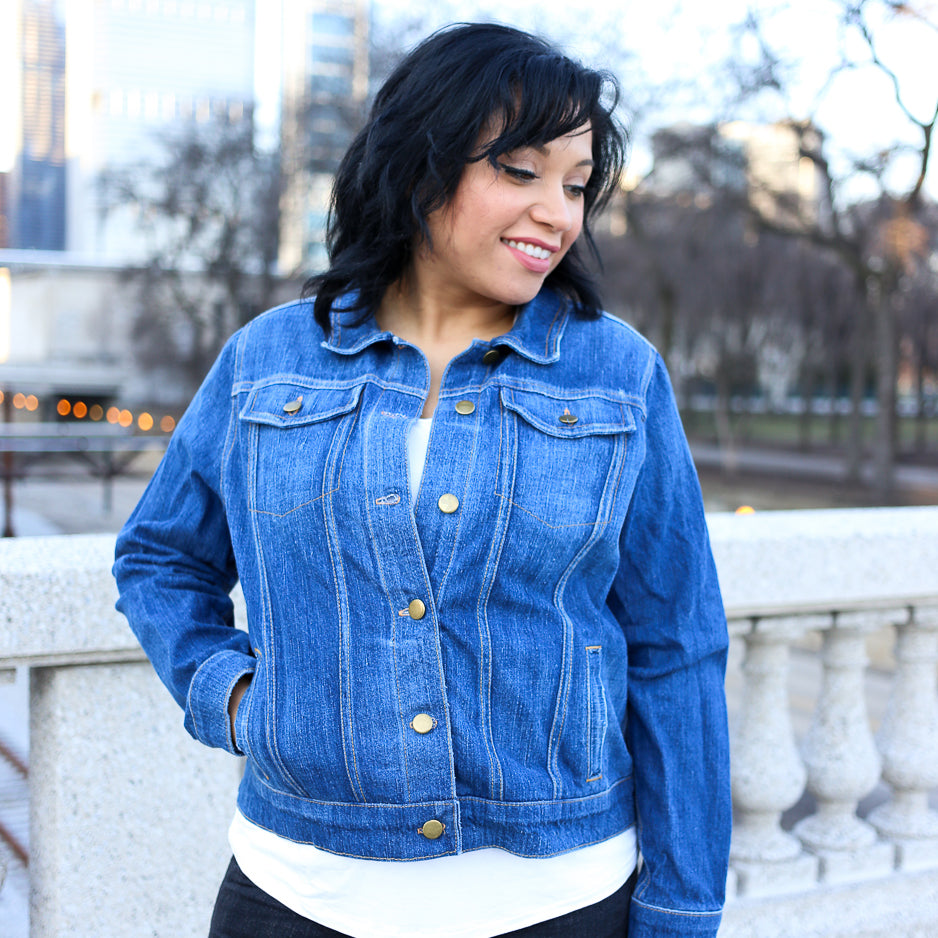 Woman wearing the Hampton Jean Jacket sewing pattern by Alina Sewing and Design Co. A jacket pattern made in non-stretch denim, cotton twill, linen or wool fabric featuring welt pockets, in-panel top pockets, long sleeves and a button front.
