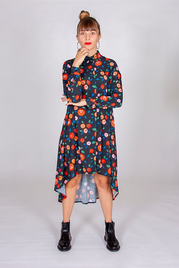 Woman wearing the Irma Dress sewing pattern from I AM Patterns on The Fold Line. A dress pattern made in poplin, viscose, lightweight denim, crepe, washed linen, chambray, wax, flannel, lightweight cotton twill, lightweight woollen fabric, or lightweight 