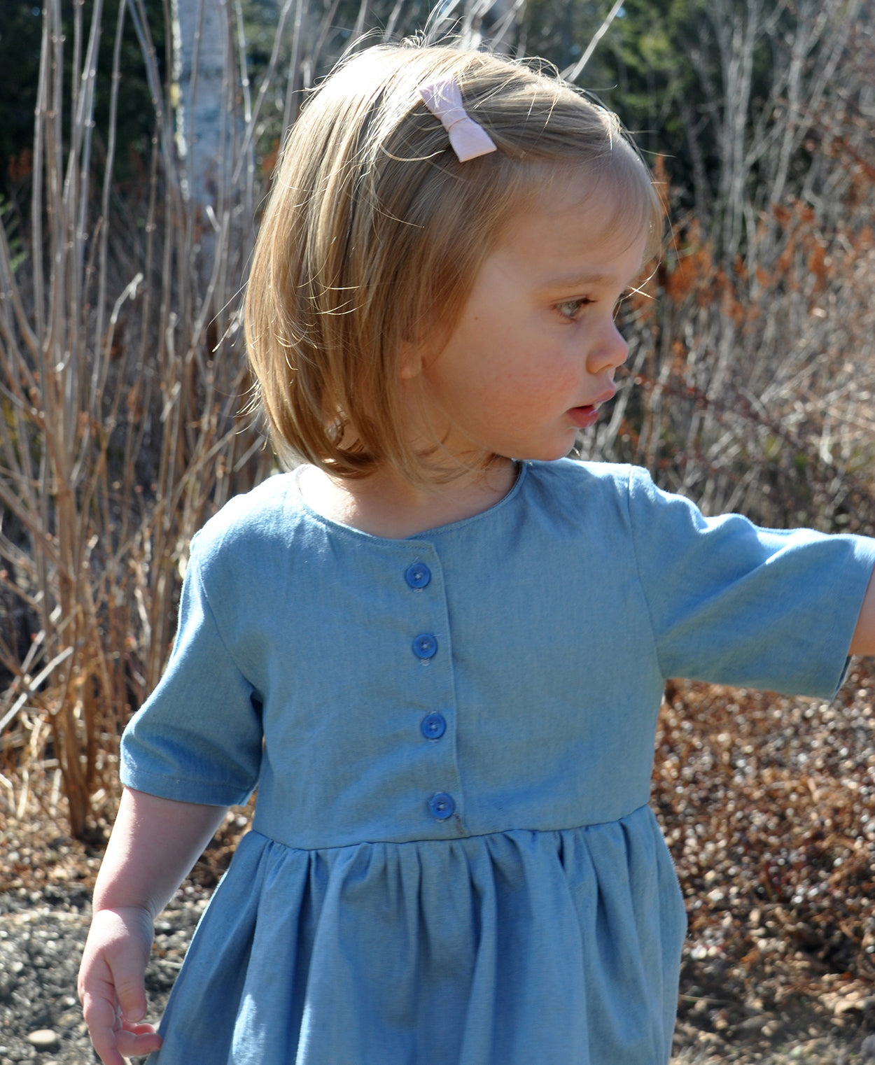 Below the Kōwhai Baby/Child Kauri Dress