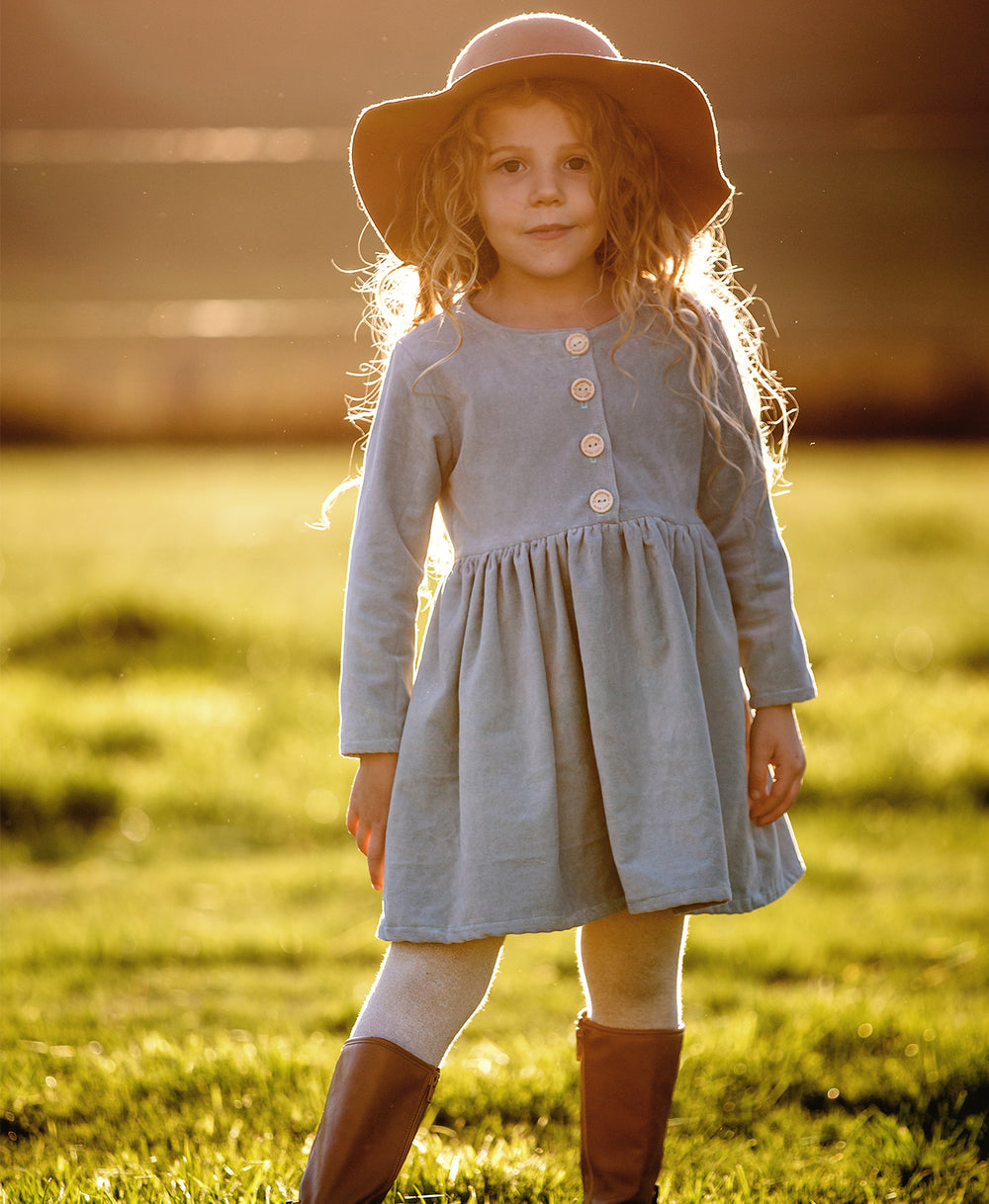 Below the Kōwhai Baby/Child Kauri Dress