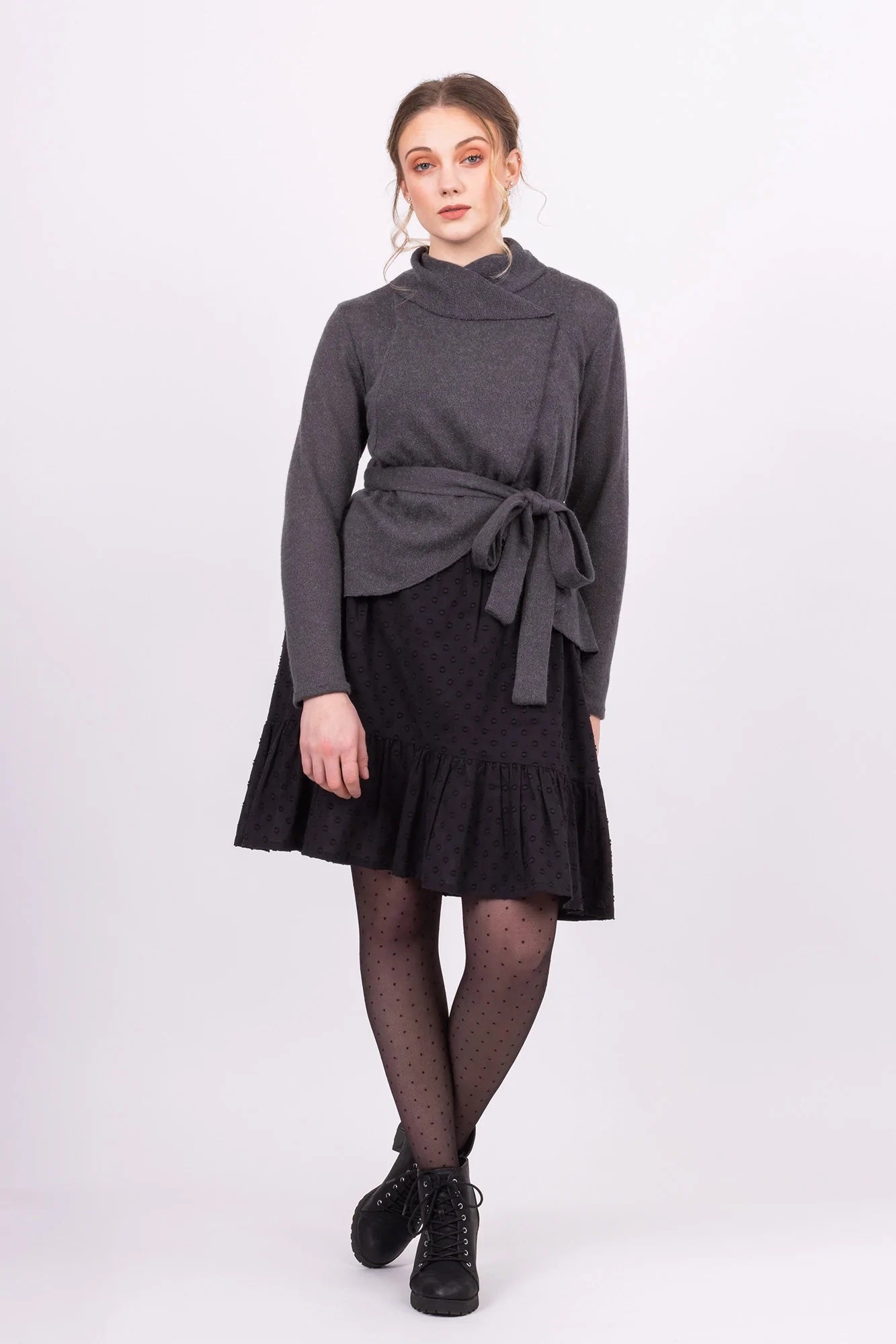 Women wearing the Kirsi Cardigan sewing pattern from Forget-me-not Patterns on The Fold Line. A dress pattern made in double knit/interlock knits, waffle knit, ponte or lightweight boiled wool fabrics, featuring a draped front opening, round collar, flare