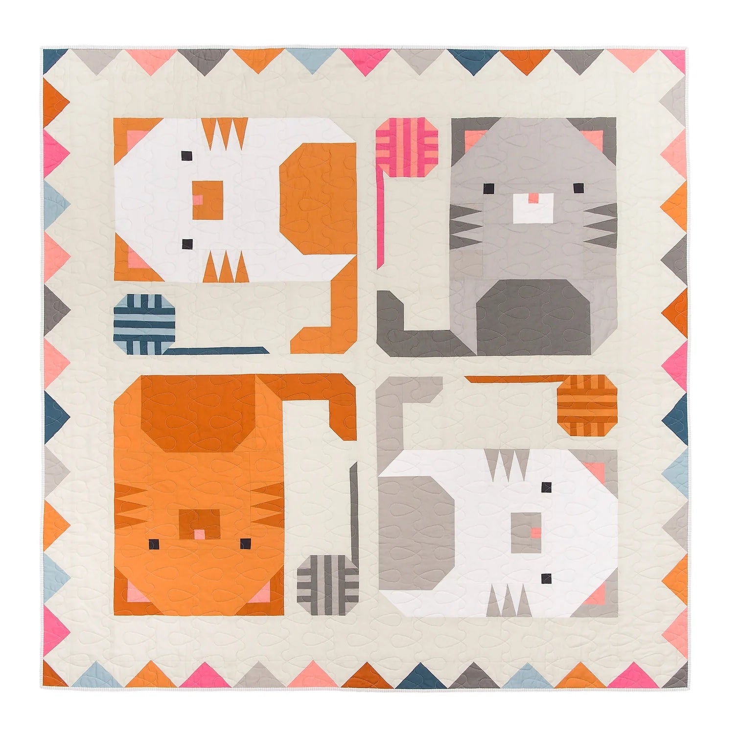 Photo showing the Kitten Around Quilt sewing pattern from Pen and Paper Patterns on The Fold Line. A quilt pattern made in quilting cotton fabrics, featuring four kittens on a cream background with multicoloured triangles along the quilts edges.