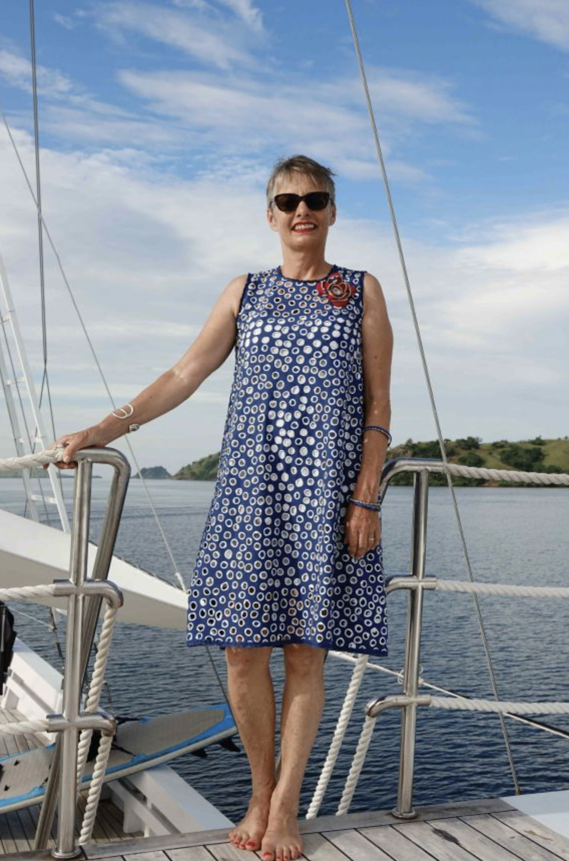 Woman wearing the Komodo Triangle Dress sewing pattern by Alice and Co Patterns. A sleeveless, dress pattern made in any weight of fabric, stiffer fabrics will emphasise the cone-like shape, whilst lighter weights will give you more swish, featuring a bia