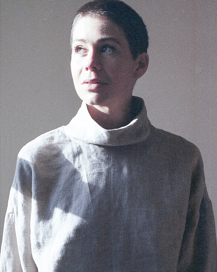 Women wearing the LB Pullover sewing pattern from Paper Theory Patterns on The Fold Line. A jumper pattern made in low-medium stretch or woven fabrics, featuring a relaxed boxy fit, turtleneck, dropped shoulders and full length sleeves.